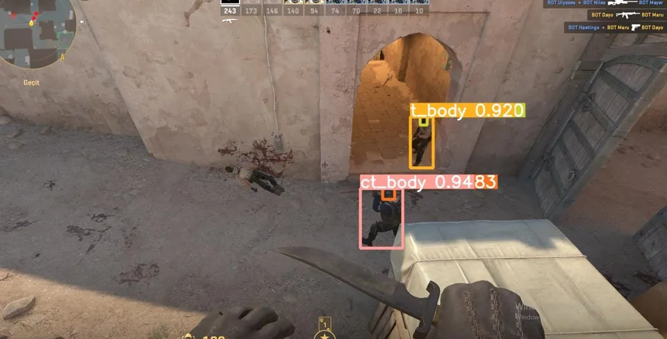 A multiplayer game frame with detected players highlighted by bounding boxes